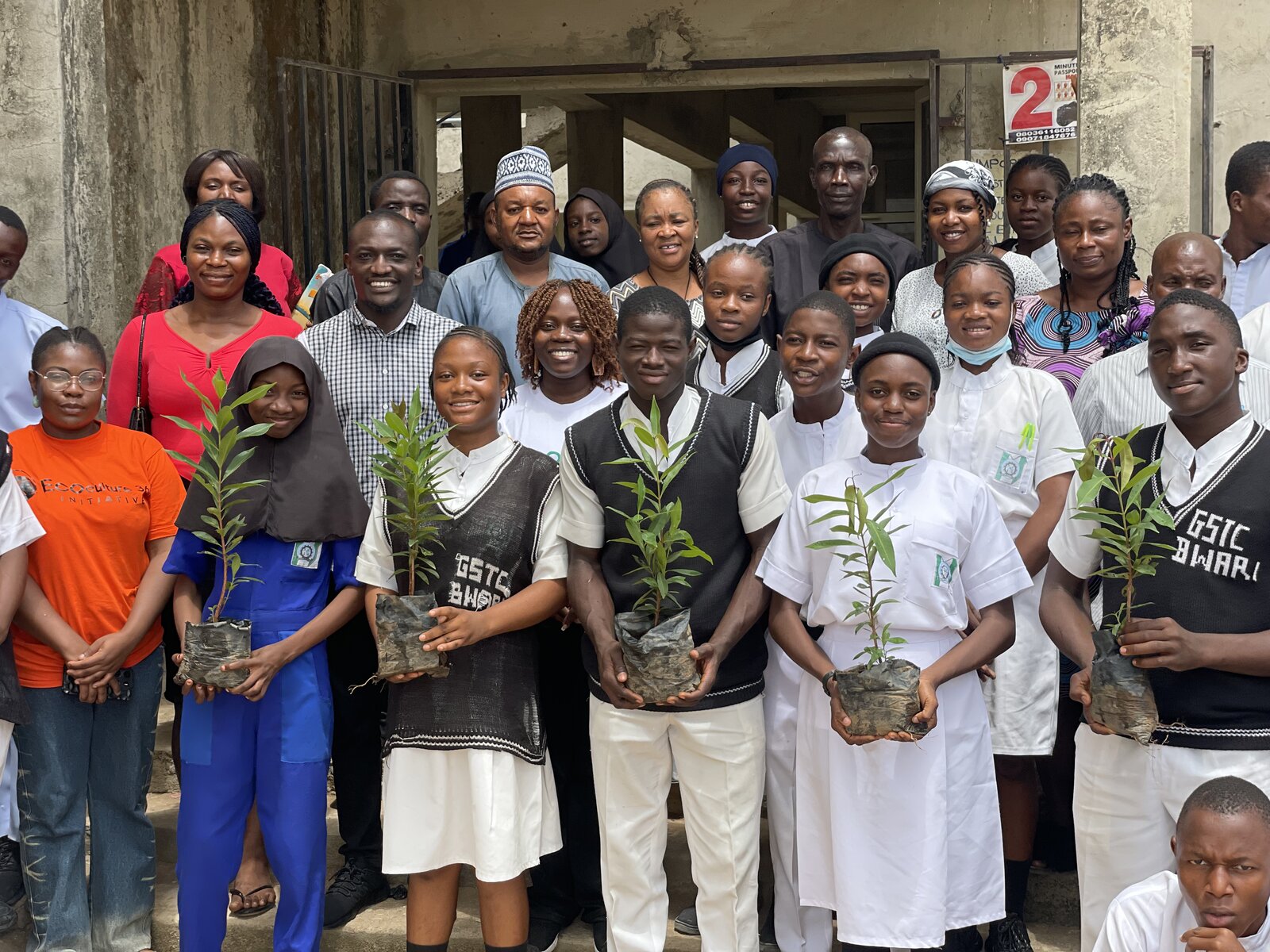 Volunteers planting a tree at a community site in Bwari, Abuja